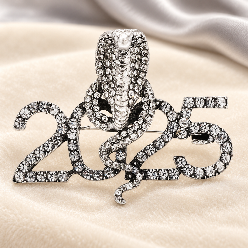 Rhinestone Cobra with 2025 Numerals Brooch — styled background