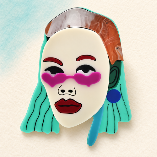 Acrylic Woman with Bold Makeup Brooch — styled background