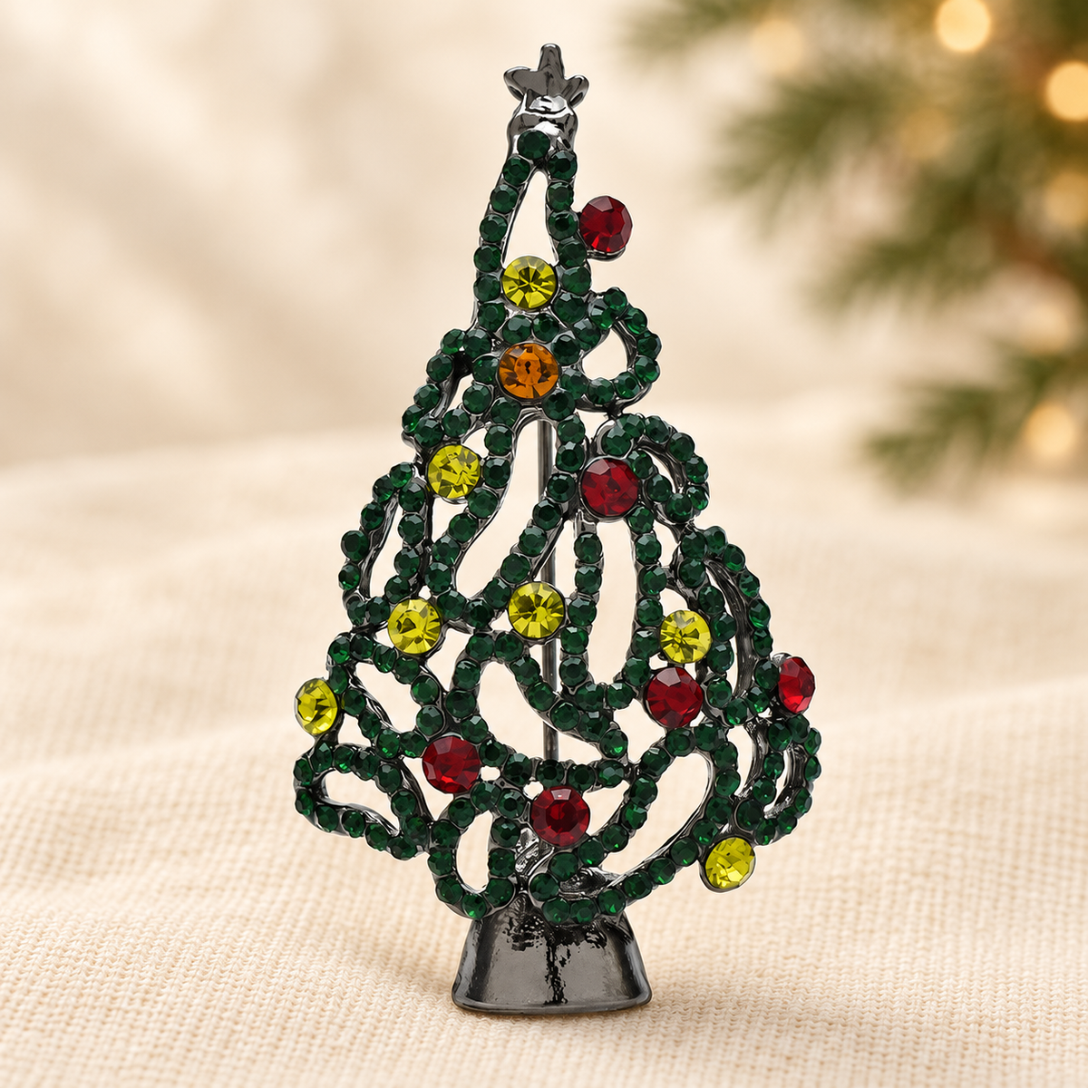 Openwork Christmas Tree with Colorful Ornaments Brooch — styled background