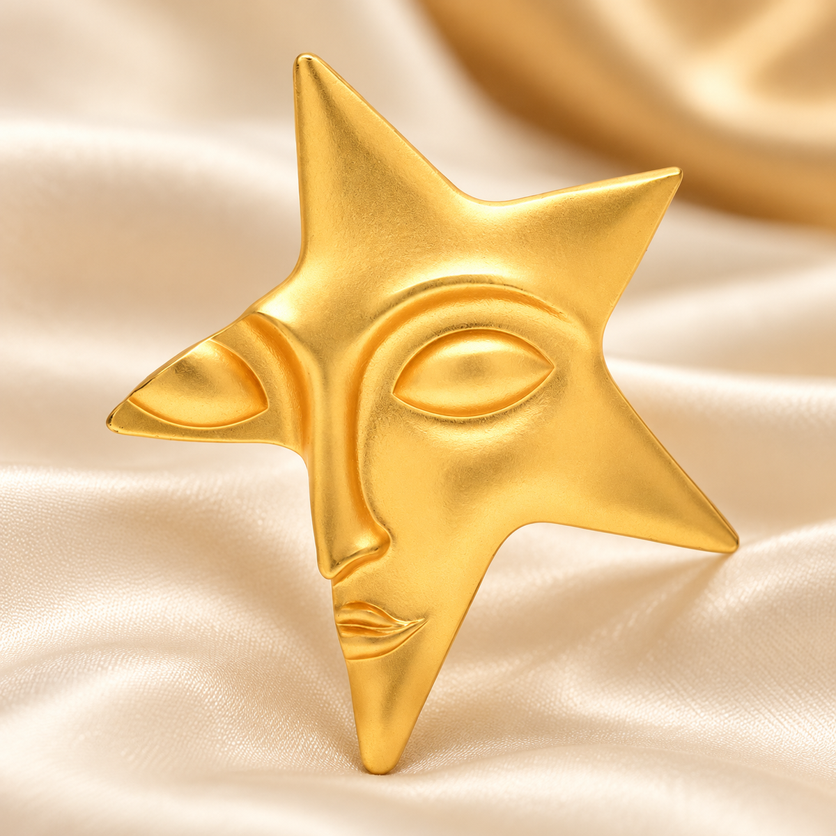 Sculpted Star Face Brooch — styled background