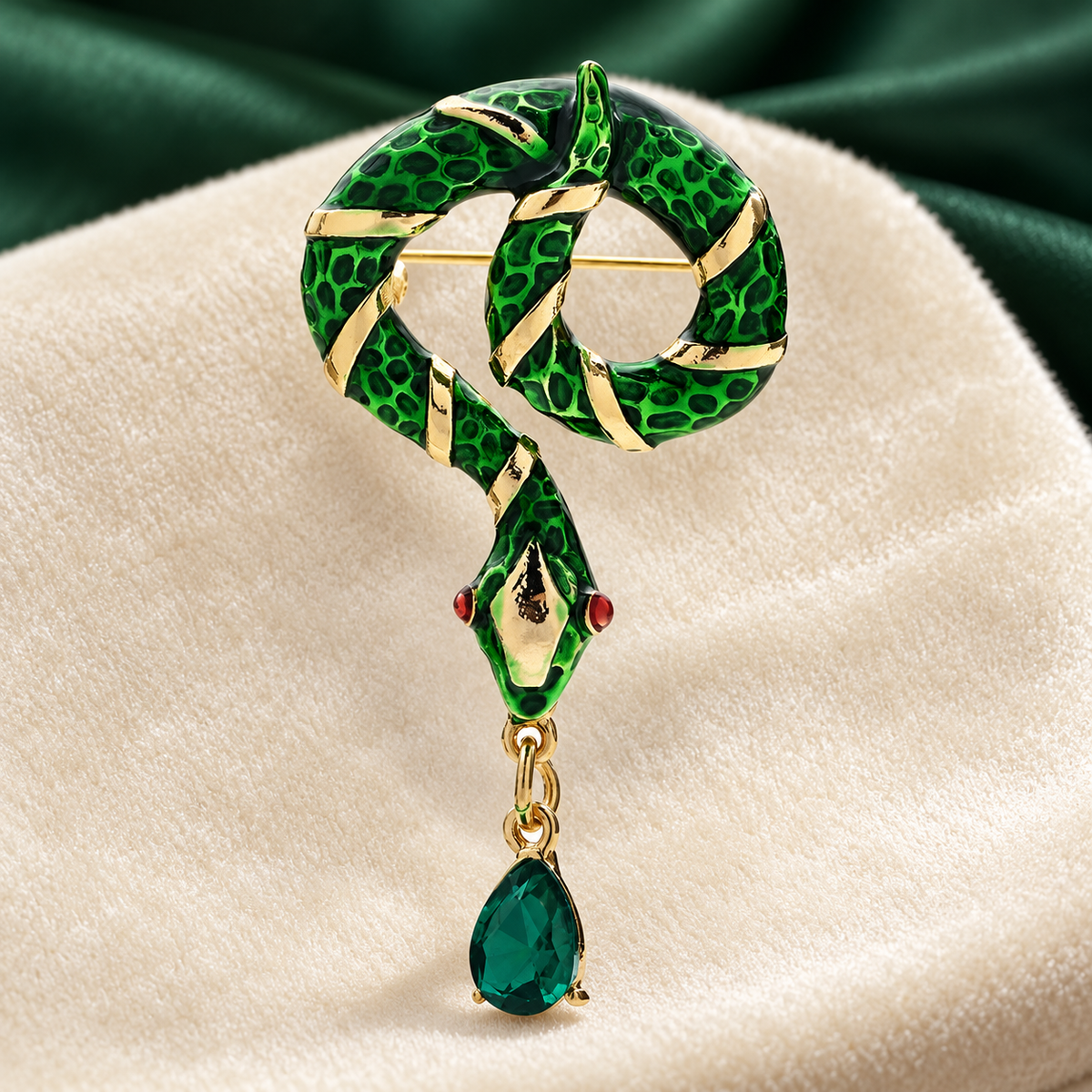 Looped Enamel Snake with Teardrop Pendant Brooch — styled background