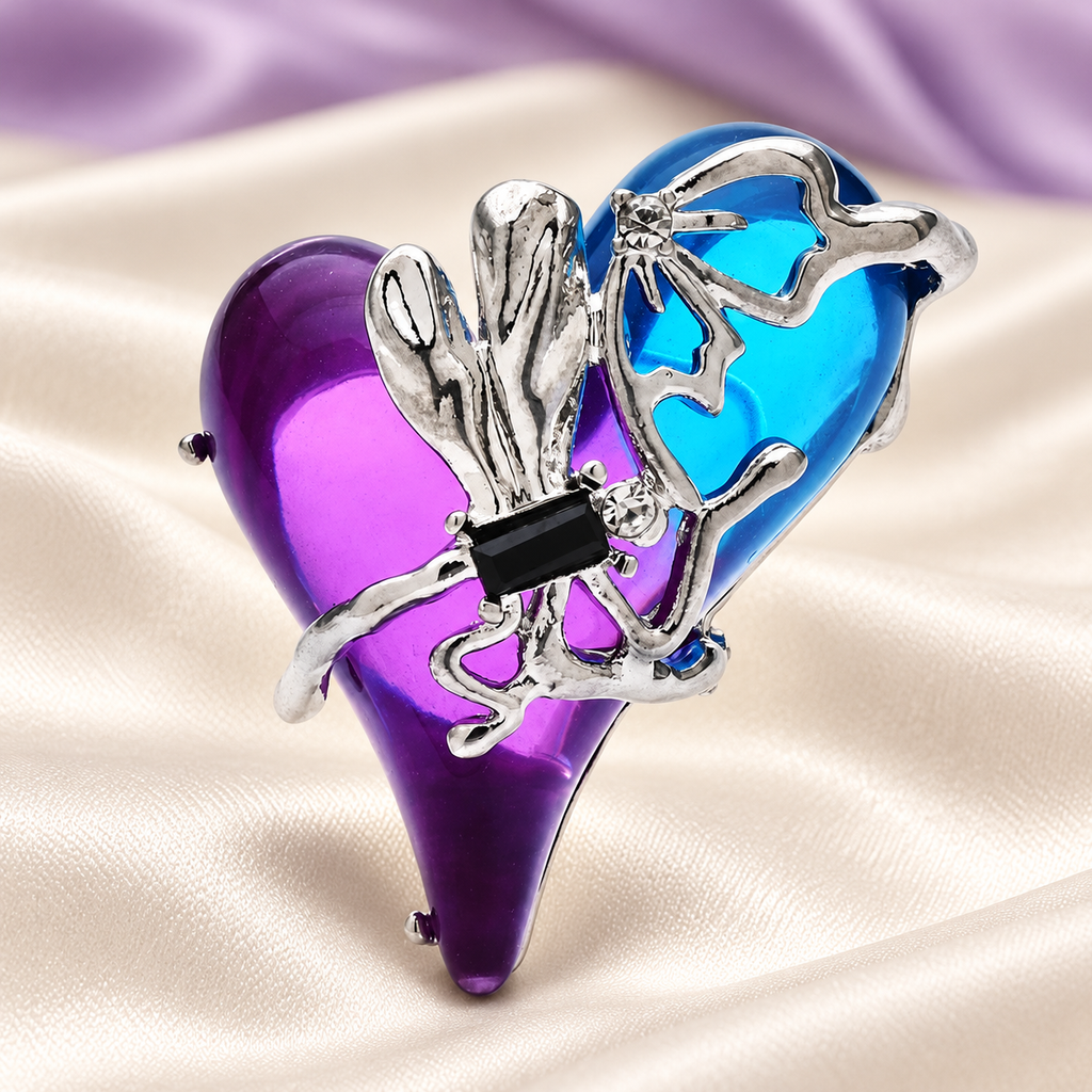 Blue and Purple Heart with Silver-Tone Dragonfly Brooch — styled background