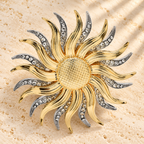 Layered Sun with Rhinestone Rays Brooch — styled background