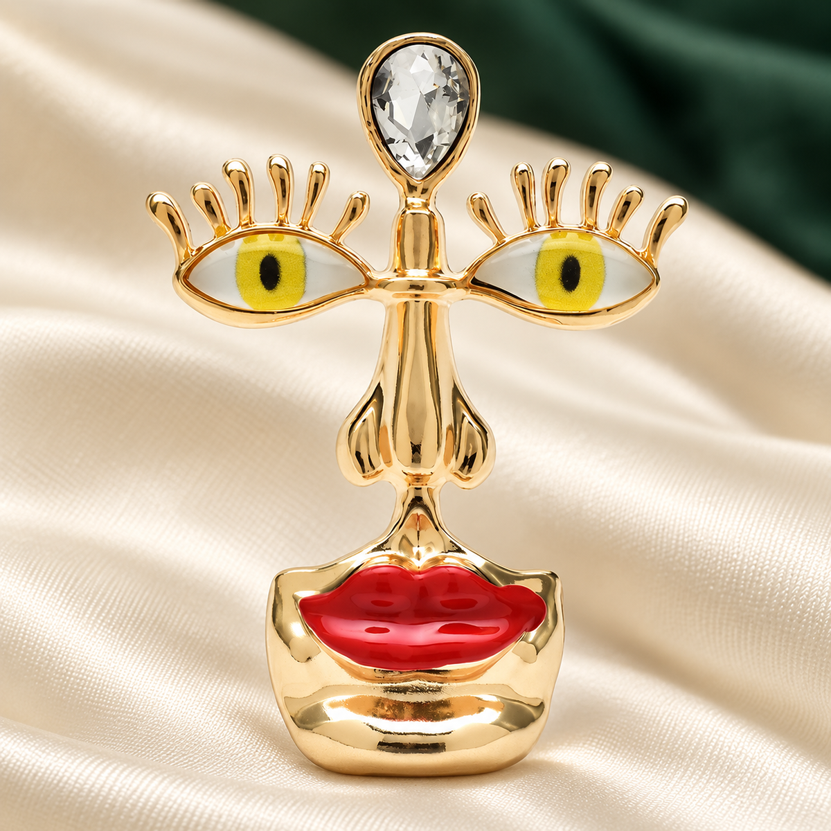 Surreal Face with Yellow Eyes and Red Lips Brooch — styled background