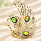 Openwork Swan with Iridescent Accents Brooch — styled background