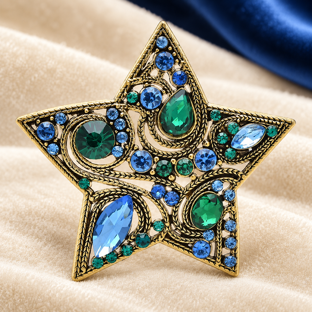 Green and Blue Jeweled Star Brooch — styled background