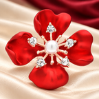 Red Enamel Flower with Pearl-Look Center Brooch — styled background