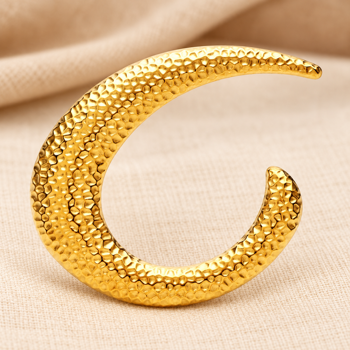 Textured Crescent Loop Brooch — styled background