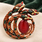 Twin Snakes with Oval Center Brooch — styled background
