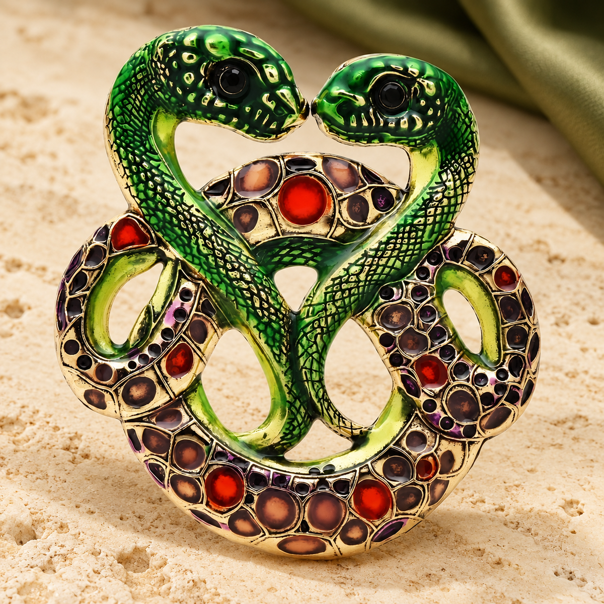 Intertwined Enamel Snake Pair Brooch — styled background