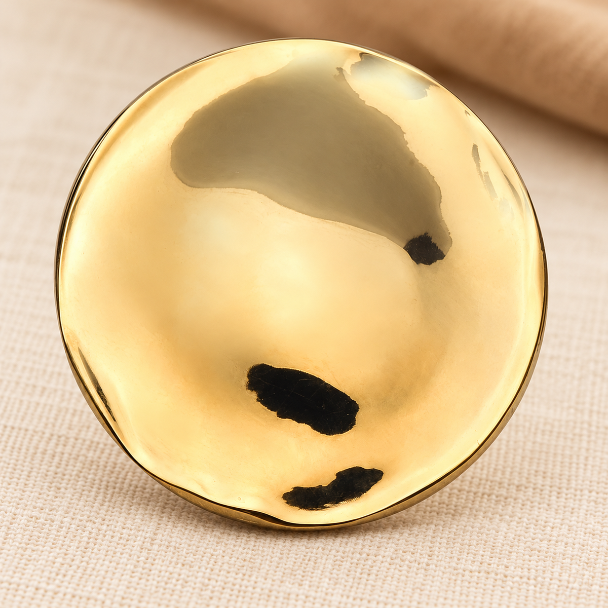 Polished Domed Circle Brooch — styled background