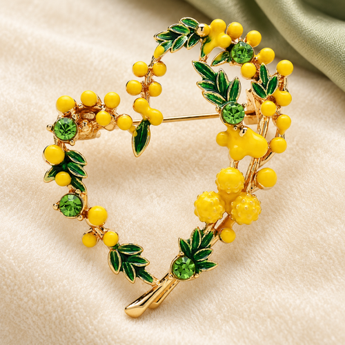 Berry and Leaf Heart Wreath Brooch — styled background