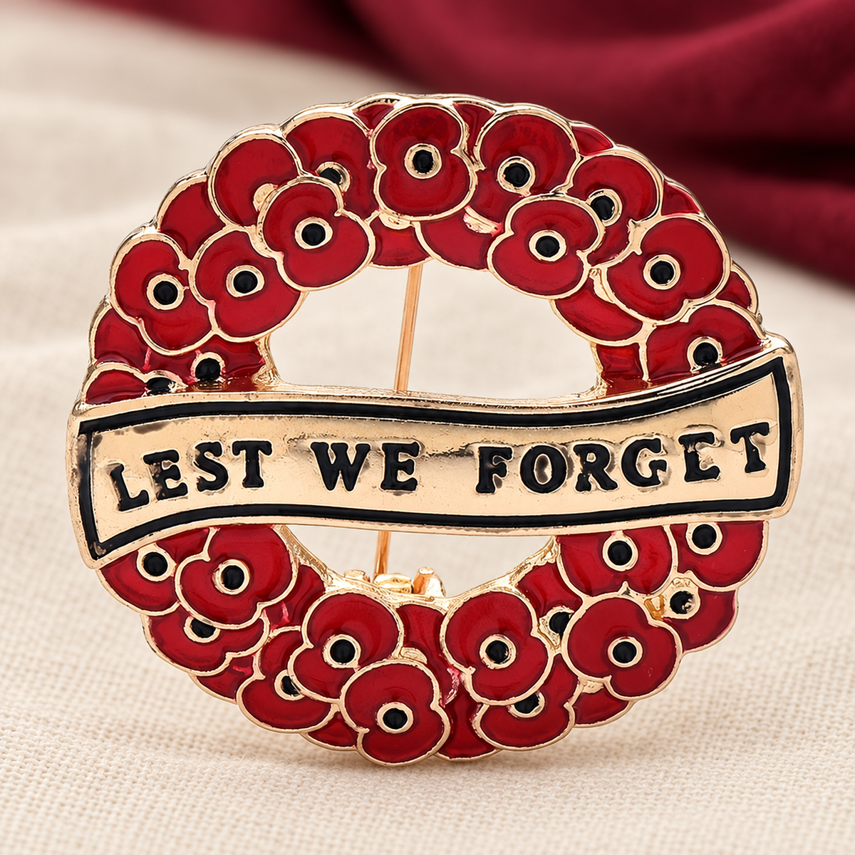 Lest We Forget Red Poppy Wreath Brooch — styled background