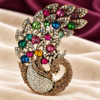 Large Multicolor Jeweled Peacock Brooch — styled background