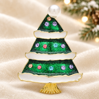 Snow-Edged Green Christmas Tree Brooch — styled background