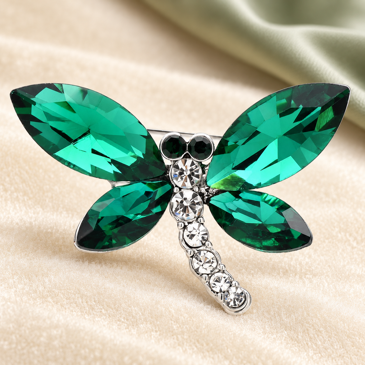 Faceted Wing Dragonfly Brooch — styled background
