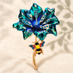 Enamel Flower with Bee on Curved Stem Brooch — styled background