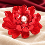 Red Enamel Peony with Pearl-Look Center Brooch — styled background