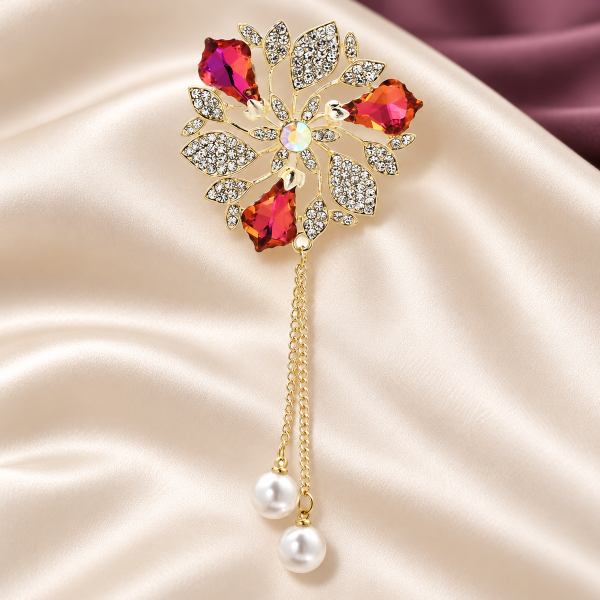 Faceted Flower with Pearl-Look Chain Tassels Brooch — styled background
