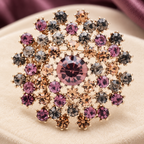 Rhinestone Dandelion Flower with Faceted Center Brooch — styled background