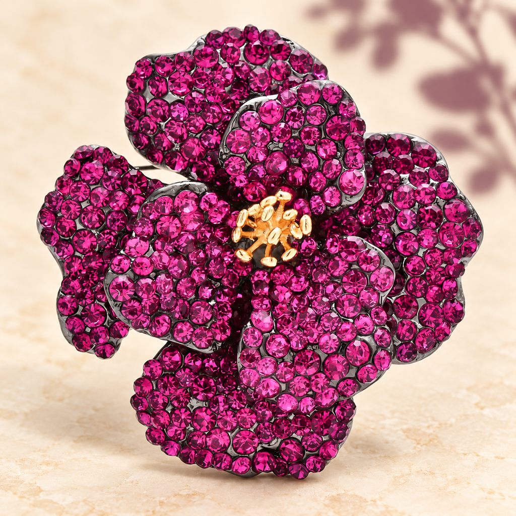 Layered Rhinestone Flower with Golden Center Brooch — styled background