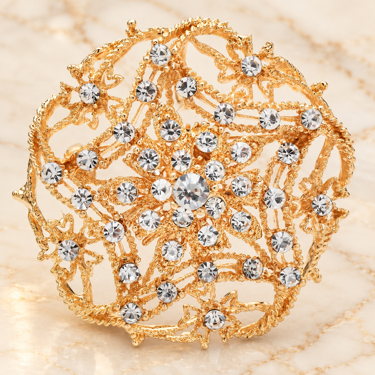 Openwork Star Flower Rhinestone Medallion Brooch — styled background