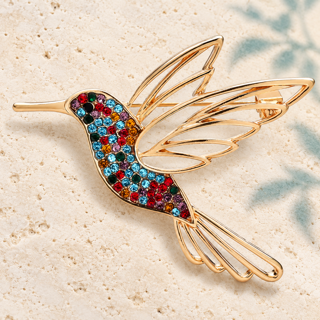 Rhinestone Hummingbird with Openwork Wings Brooch — styled background