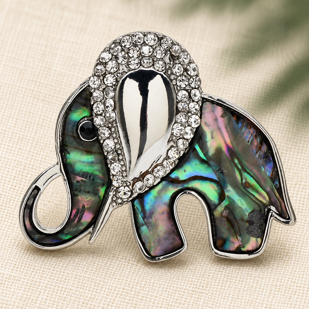 Rhinestone Elephant with Pearl-Look or Abalone-Look Inset Brooch — styled background
