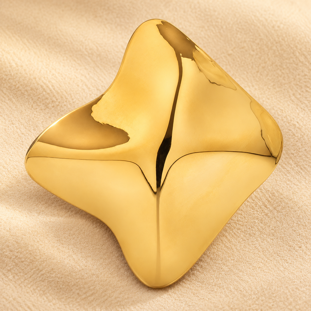 Wavy Diamond-Shaped Metal Brooch — styled background