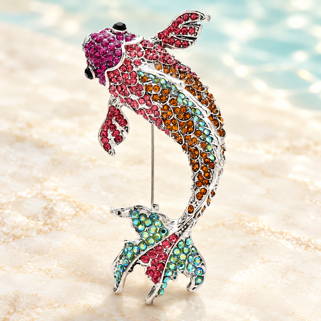 Jeweled Swimming Koi Fish Brooch — styled background