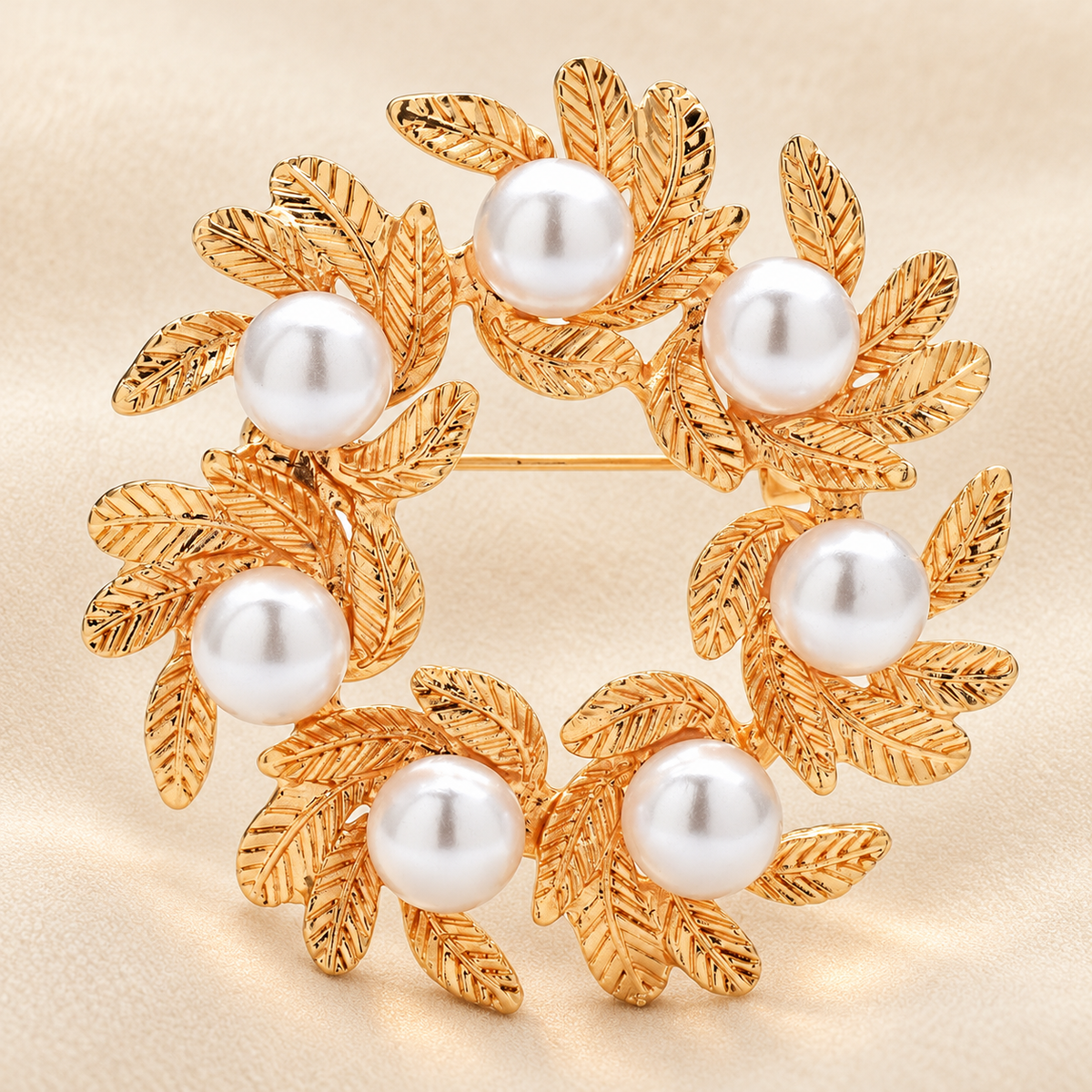 Leaf Wreath with Pearl-Look Accents Brooch — styled background