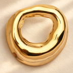 Sculptural Open Circle Stainless Steel Brooch — styled background