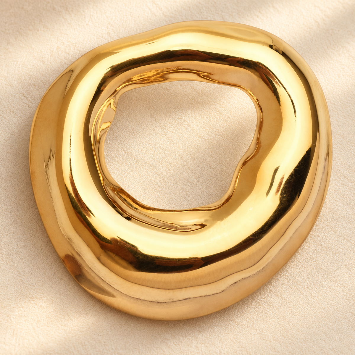 Sculptural Open Circle Stainless Steel Brooch — styled background