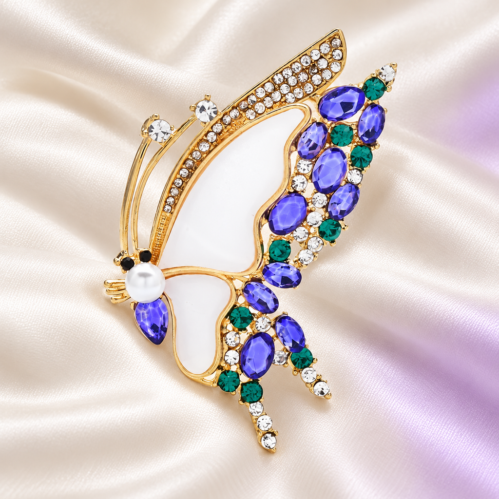 Jeweled Butterfly with White Wing Insets Brooch — styled background