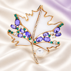 White Maple Leaf with Purple Stones Brooch — styled background
