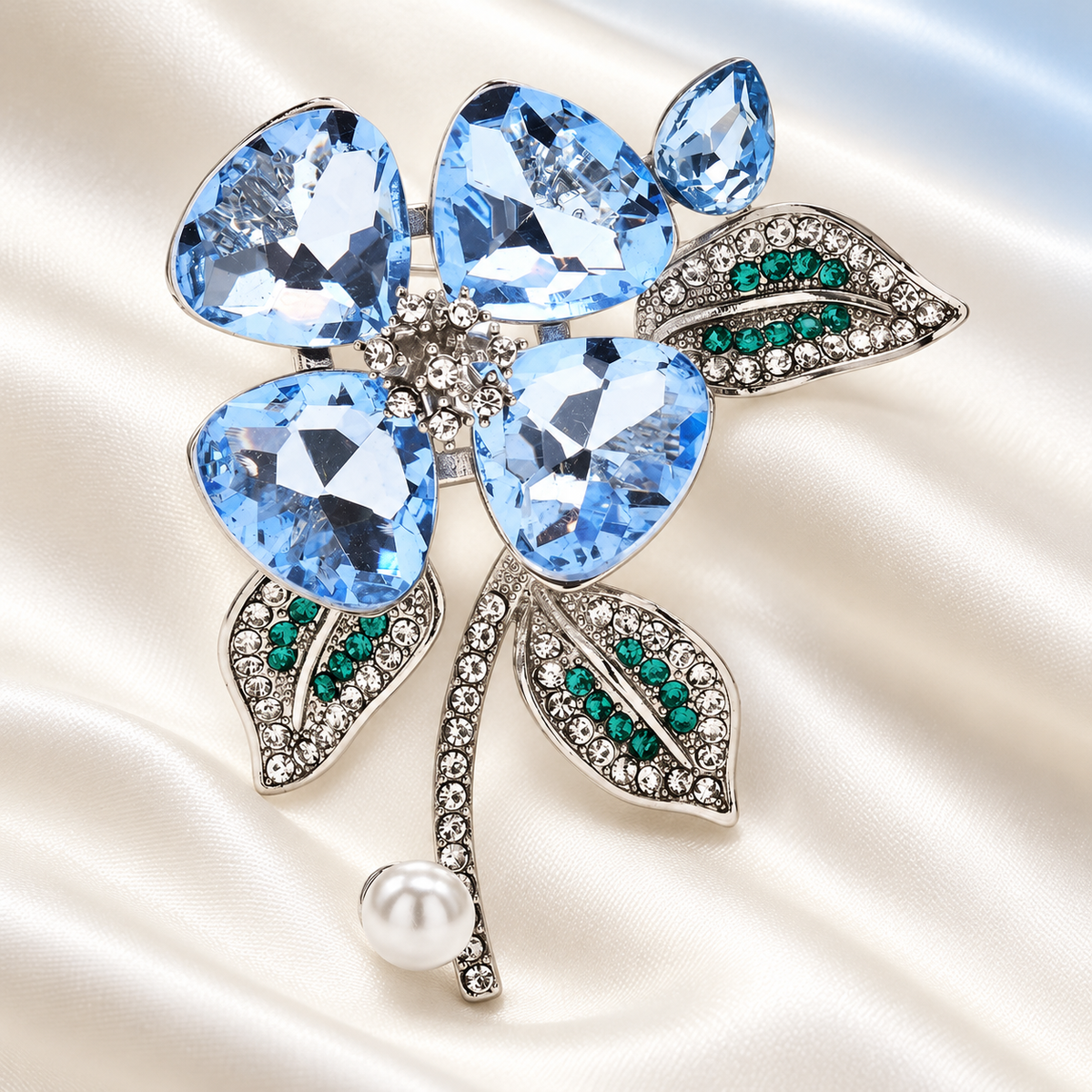 Blue Crystal Flower with Pearl-Look Drop Brooch — styled background