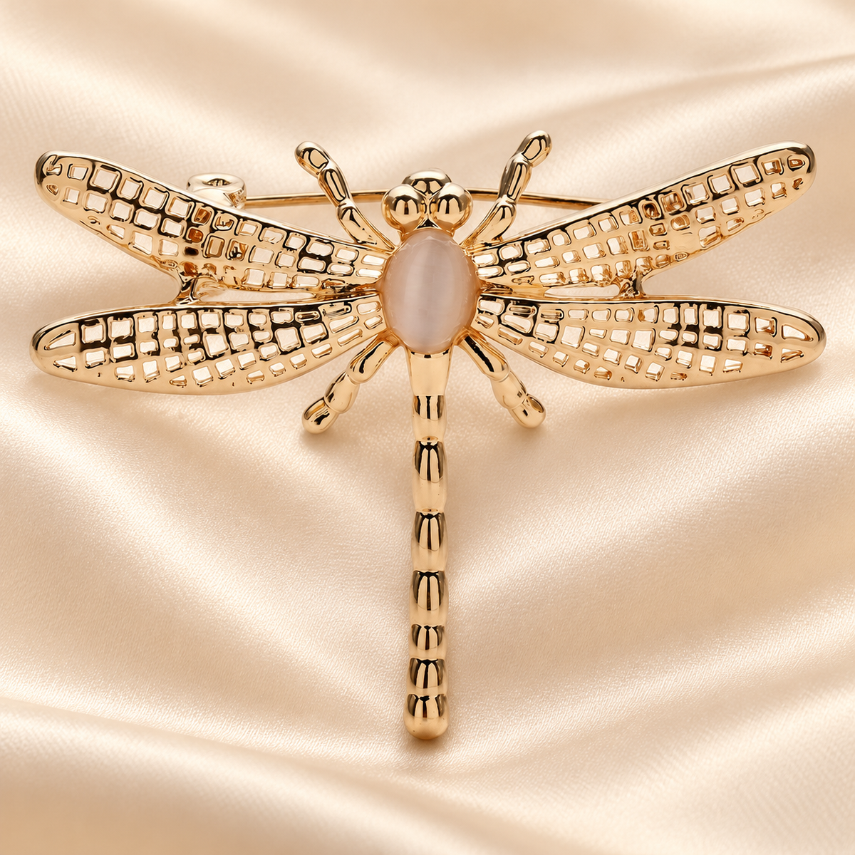 Minimal Openwork Dragonfly Brooch — styled background