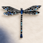 Jeweled Slender Dragonfly Brooch — styled background