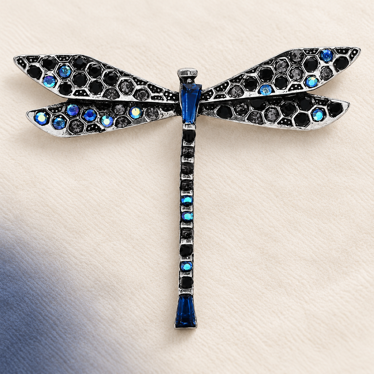 Jeweled Slender Dragonfly Brooch — styled background