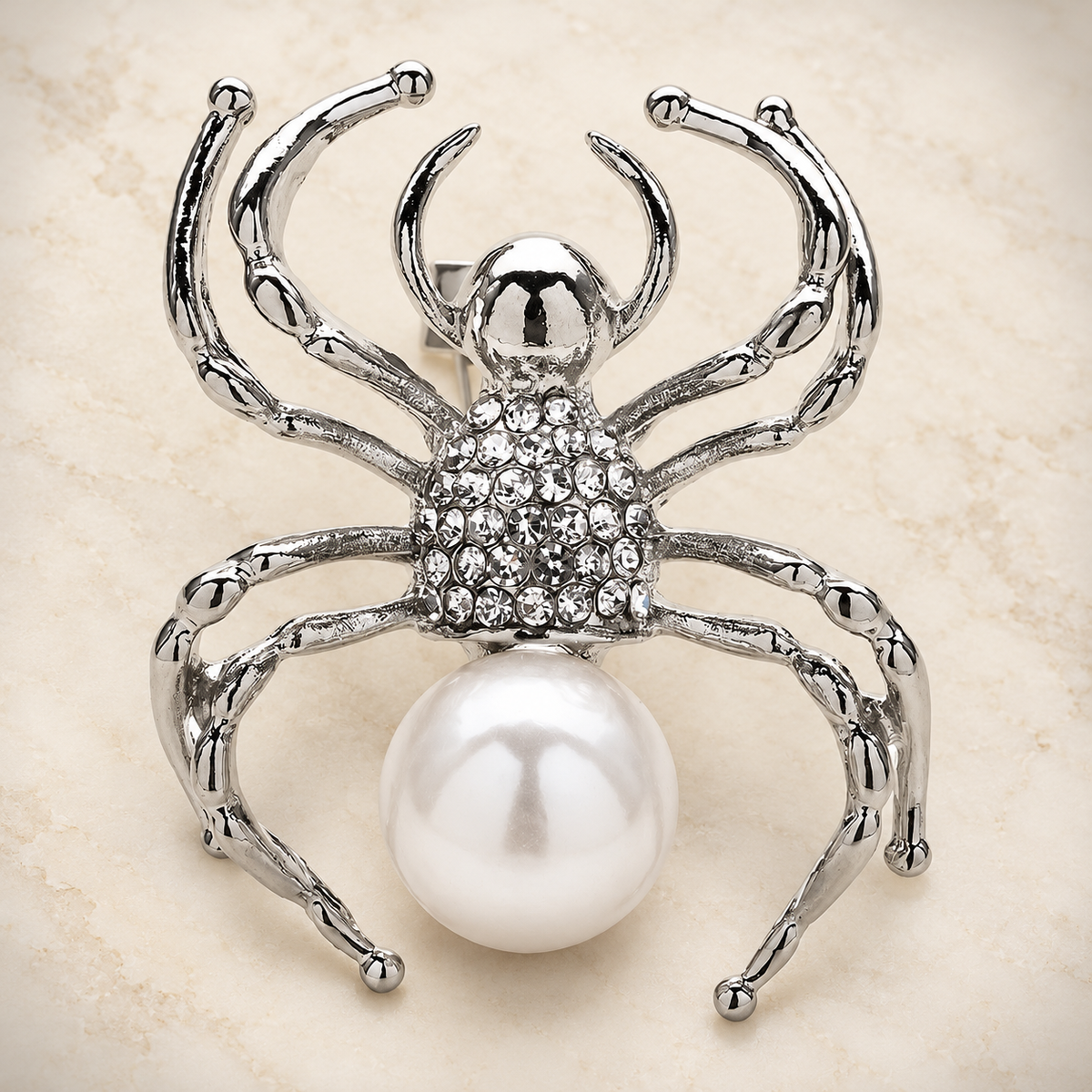 Pearl-Look Spider Brooch — styled background
