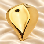 Sculptural Folded Heart Stainless Steel Brooch — styled background