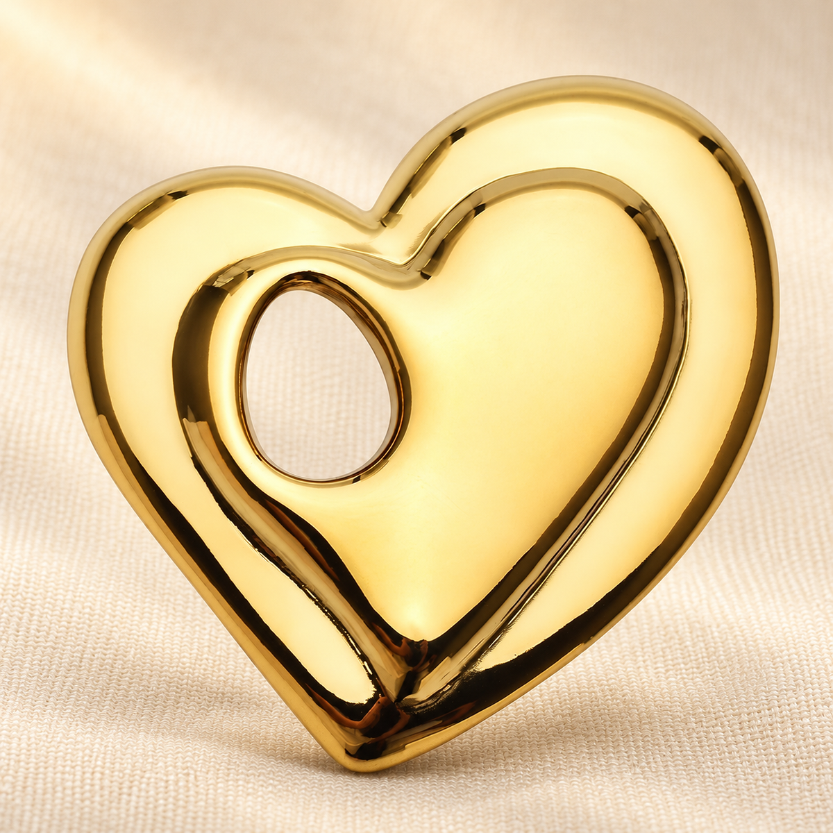 Open Double Heart Stainless Steel Brooch — styled background