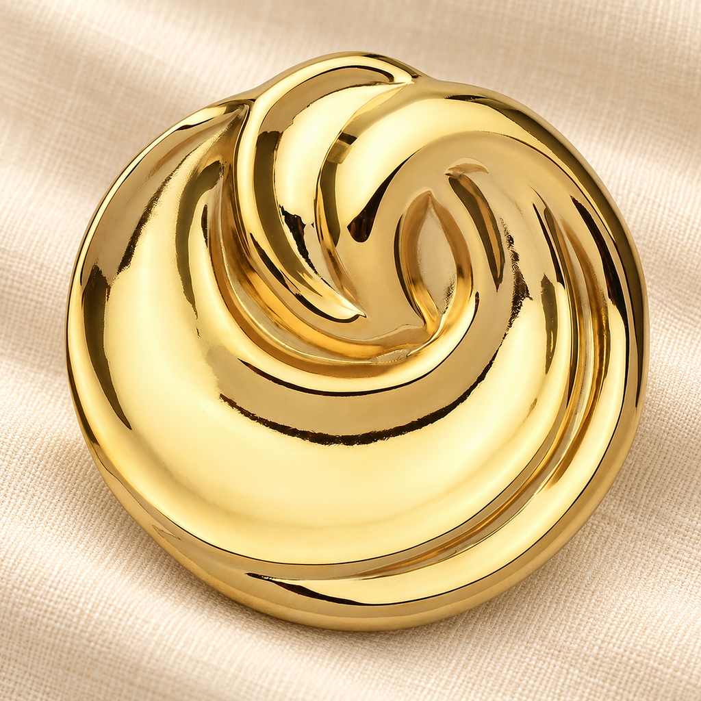 Polished Spiral Knot Stainless Steel Brooch — styled background