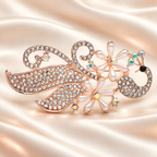 Rhinestone Peacock with Pearl-Look Flower Brooch — styled background