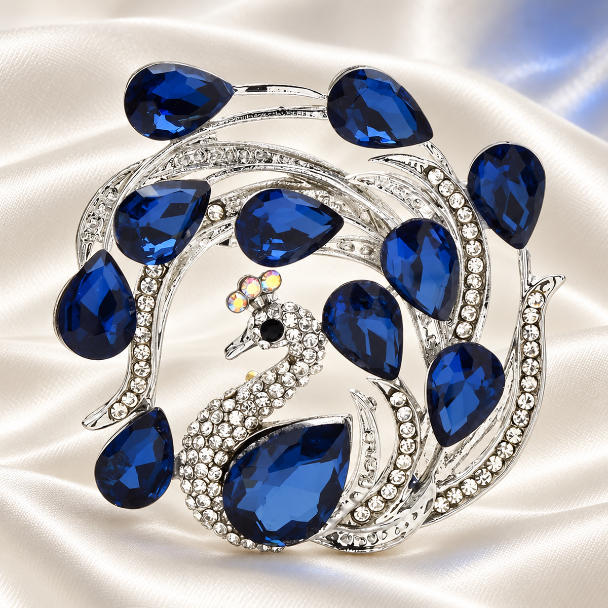 Circular Peacock with Faceted Rhinestones Brooch — styled background