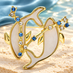 Pisces Dolphins with Blue Star Accents Brooch — styled background