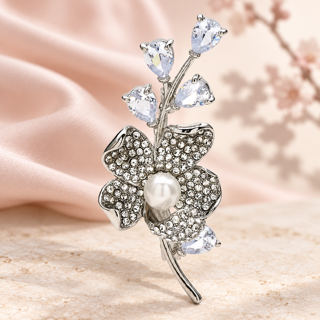 Crystal Plum Blossom Sprig Brooch — styled background