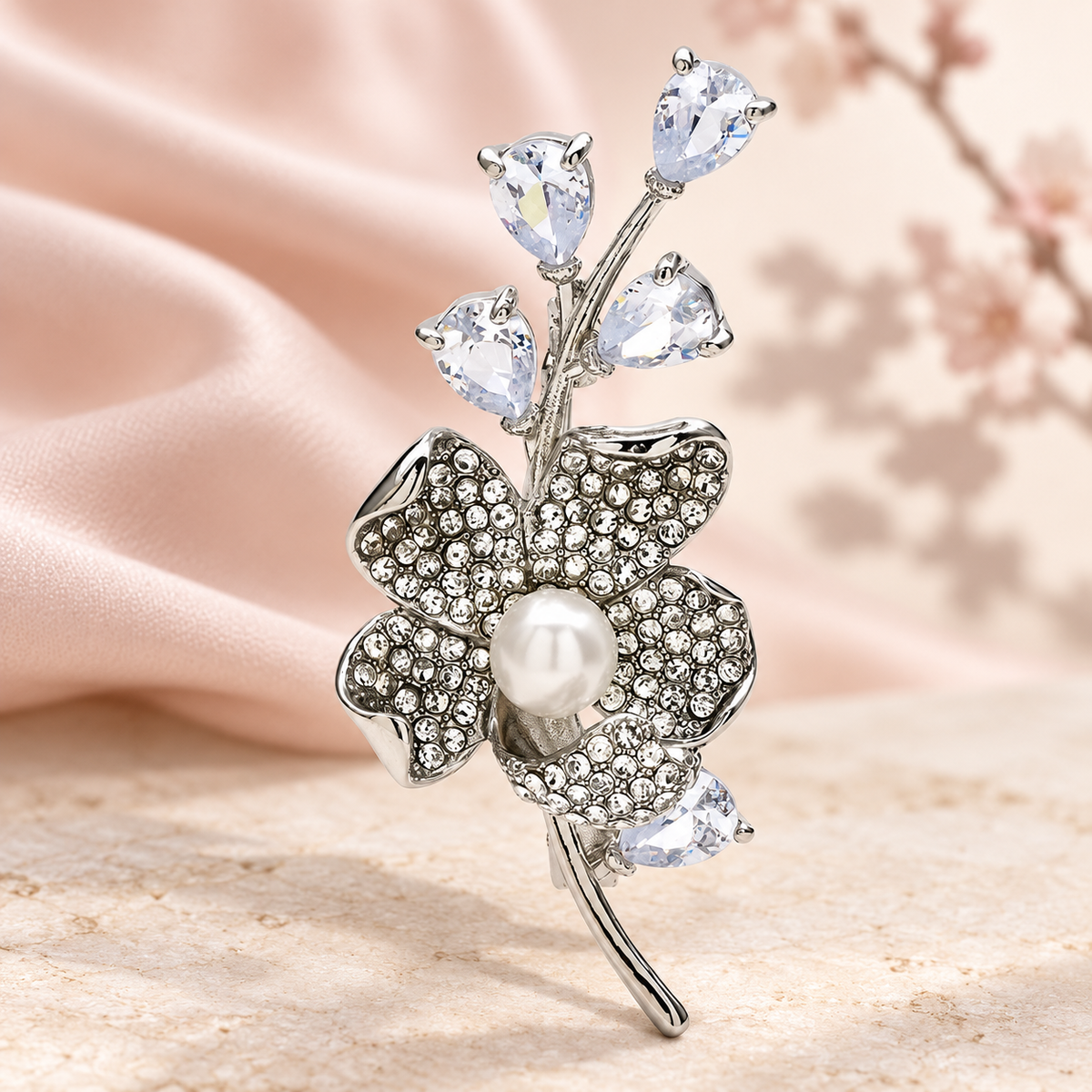 Crystal Plum Blossom Sprig Brooch — styled background