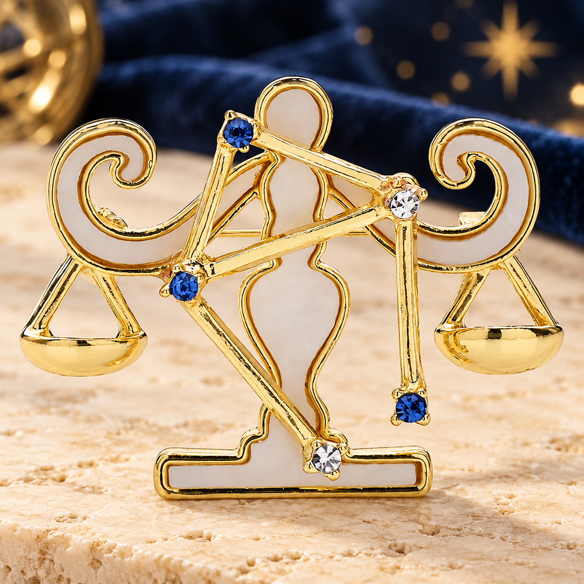 Libra Zodiac with Blue Star Accents Brooch — styled background