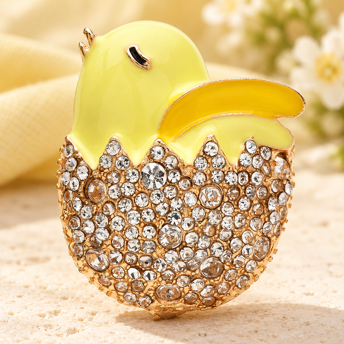 Chick Hatching from Rhinestone Egg Brooch — styled background